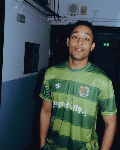 Loyle Carner - hopefully ! green football shirt